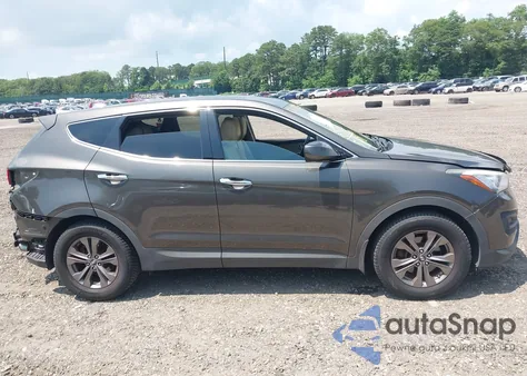2014 Hyundai Santa Fe Sport 2.4L z USA, uszkodzony, nr VIN 5XYZT3LB8EG211915